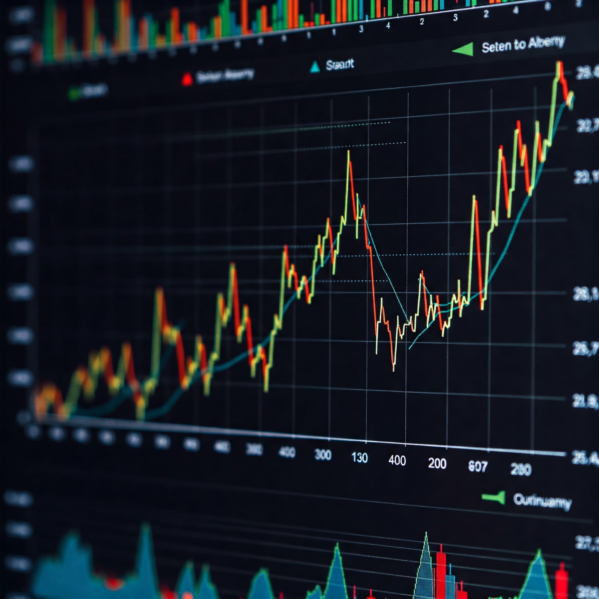 photo of Stock Market Chart on Dark Screen